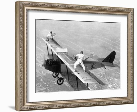 Daredevils Playing Tennis on a Biplane--Framed Photographic Print