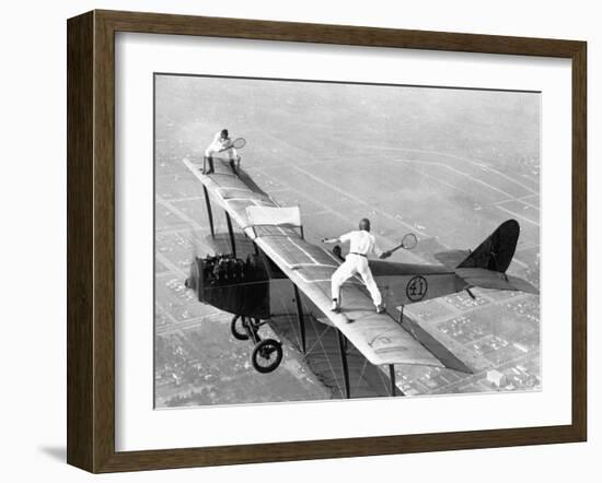 Daredevils Playing Tennis on a Biplane-null-Framed Photographic Print