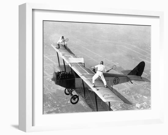 Daredevils Playing Tennis on a Biplane-null-Framed Photographic Print