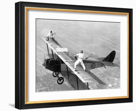 Daredevils Playing Tennis on a Biplane-null-Framed Photographic Print