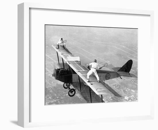 Daredevils Playing Tennis on a Biplane-null-Framed Photographic Print