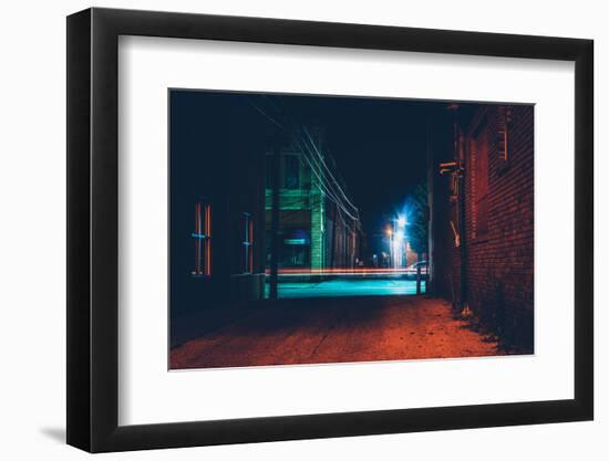 Dark Alley and Light Trails in Hanover, Pennsylvania at Night.-Jon Bilous-Framed Photographic Print