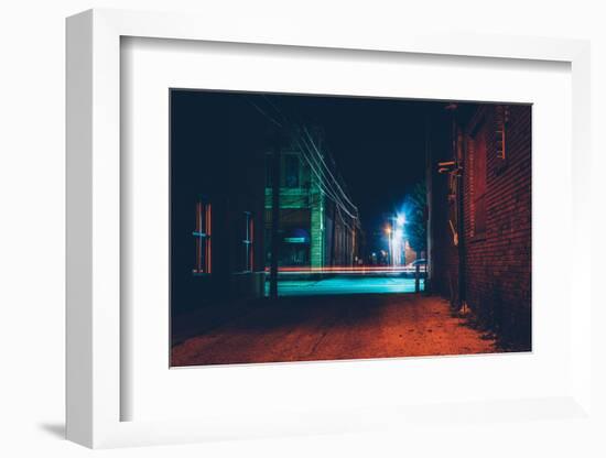 Dark Alley and Light Trails in Hanover, Pennsylvania at Night.-Jon Bilous-Framed Photographic Print