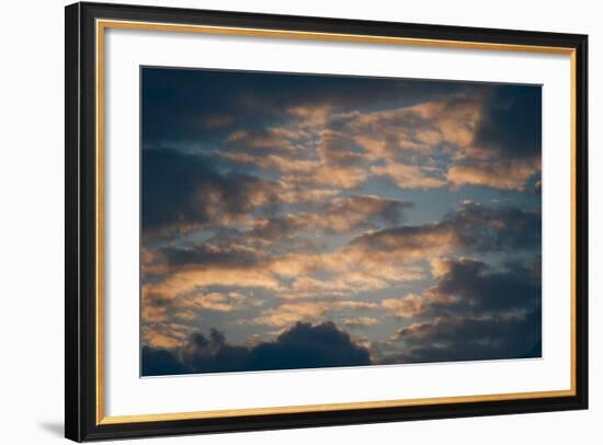 Dark Clouds over a Hilly Landscape at Sunset-Clive Nolan-Framed Photographic Print