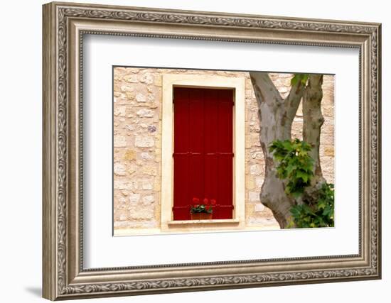 Dark red shutters in the wall of a house in France.-Tom Haseltine-Framed Photographic Print