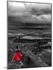 Dark storm clouds over Dead Horse Point State Park with girl in red dress standing near the cliff-David Chang-Mounted Photographic Print