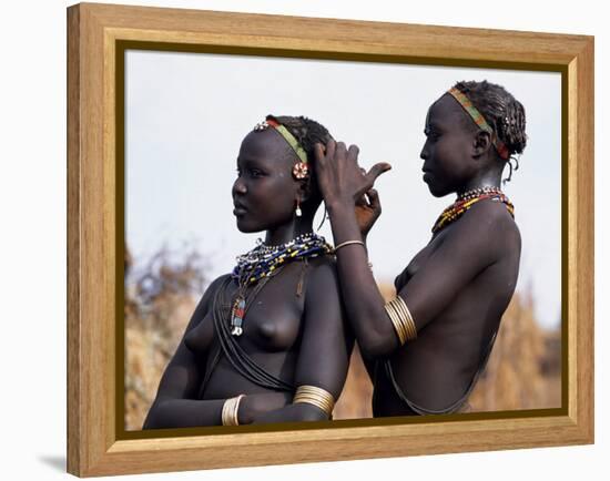 Dassanech Girl Braids Her Sister's Hair at Her Village in the Omo Delta-John Warburton-lee-Framed Premier Image Canvas