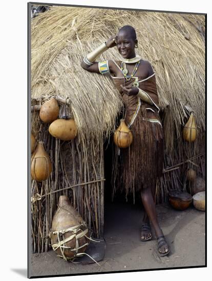 Datoga Woman Relaxes Outside Her Thatched House, Tanzania-Nigel Pavitt-Mounted Photographic Print