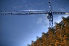 Low Angle View of Crane on Construction Site-David Barbour-Photo