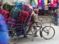 Cycle Rickshaw with a Big Load of Clothes in Amritsar, Punjab, India-David H. Wells-Photographic Print