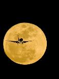 Aeroplane Silhouetted Against a Full Moon-David Nunuk-Photographic Print