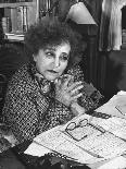 French Novelist Colette, at Desk Covered with Handwritten Notes Topped by Reading Glasses at Home-David Scherman-Premium Photographic Print