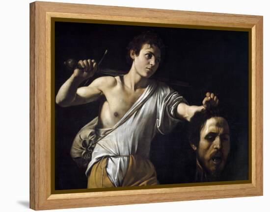 David with the Head of Goliath by Caravaggio-null-Framed Premier Image Canvas