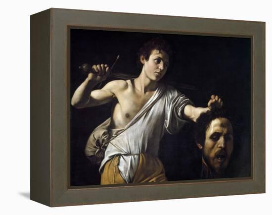 David with the Head of Goliath by Caravaggio-null-Framed Premier Image Canvas