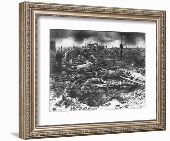 Dawn Rising on Muddy, Horrific Battlefield of Passchendaele as Soldiers Tend to the Dead During WWI-null-Framed Photographic Print