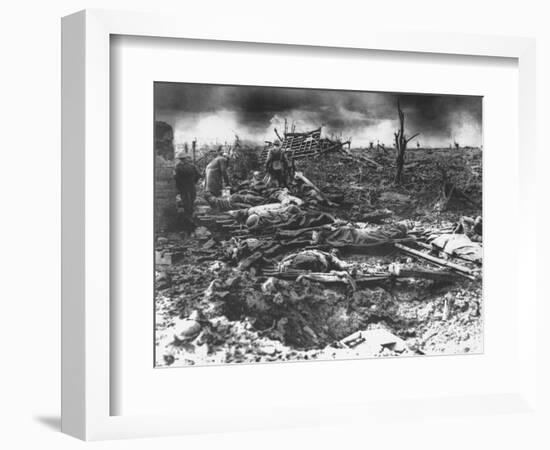 Dawn Rising on Muddy, Horrific Battlefield of Passchendaele as Soldiers Tend to the Dead During WWI-null-Framed Photographic Print