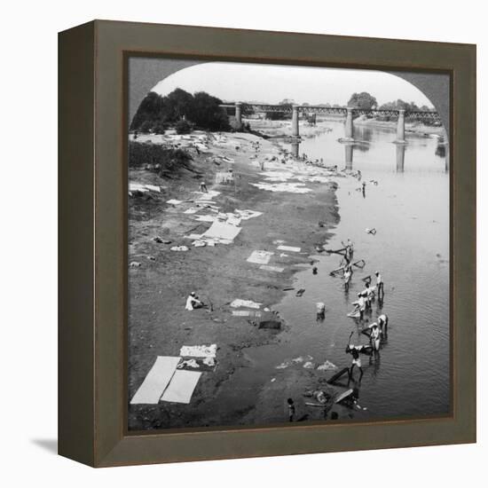 Dbobies Washing Clothes in the Goomti River, Near Lucknow, India, 1900s-Underwood & Underwood-Framed Premier Image Canvas
