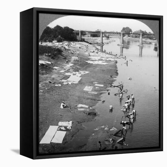 Dbobies Washing Clothes in the Goomti River, Near Lucknow, India, 1900s-Underwood & Underwood-Framed Premier Image Canvas