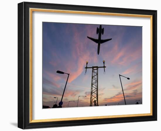 Dc9 Aircraft Approaching over Runway Landing Light Gantries at Sunset, London, England, United King-Charles Bowman-Framed Photographic Print