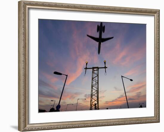 Dc9 Aircraft Approaching over Runway Landing Light Gantries at Sunset, London, England, United King-Charles Bowman-Framed Photographic Print