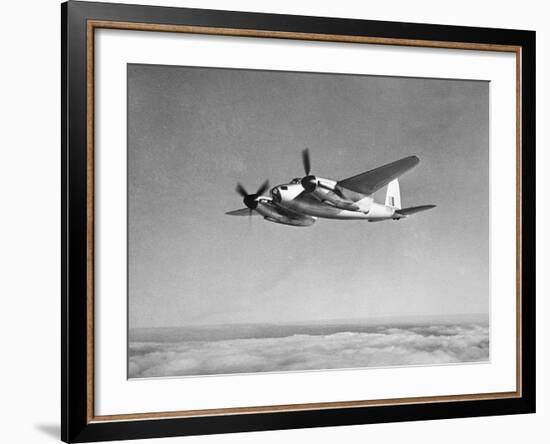 De Havilland Mosquito in Flight-null-Framed Photographic Print