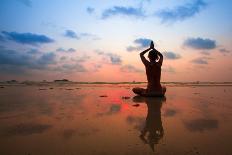 Silhouette Young Woman Practicing Yoga on the Beach at Sunset-De Visu-Photographic Print