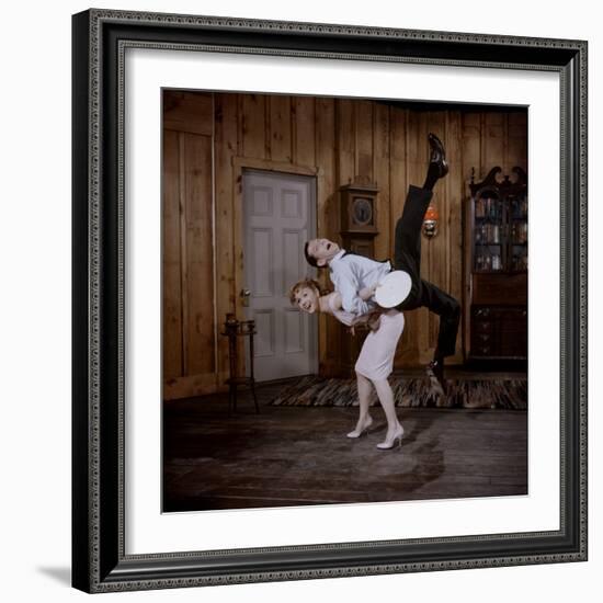 Debbie Reynolds Lifts Fellow Actor Tony Randall in a Scene from 'The Mating Game', 1959-Allan Grant-Framed Photographic Print