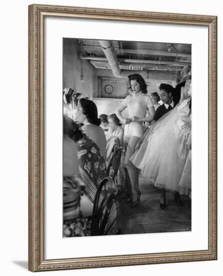 Debutante Actress Tina L. Meyer Changing Clothes Backstage in Dressing Room-Nina Leen-Framed Premium Photographic Print