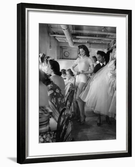 Debutante Actress Tina L. Meyer Changing Clothes Backstage in Dressing Room-Nina Leen-Framed Premium Photographic Print