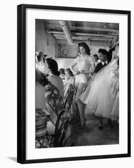 Debutante Actress Tina L. Meyer Changing Clothes Backstage in Dressing Room-Nina Leen-Framed Premium Photographic Print