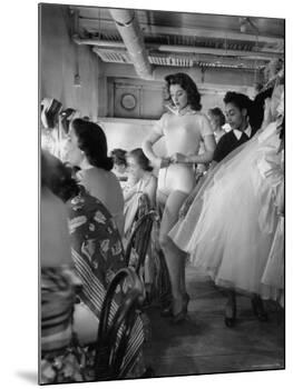 Debutante Actress Tina L. Meyer Changing Clothes Backstage in Dressing Room-Nina Leen-Mounted Premium Photographic Print