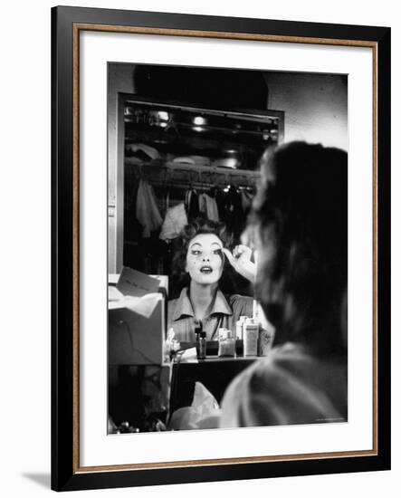 Debutante Actress Tina L. Meyer Putting on False Eyelashes in Dressing Room-Nina Leen-Framed Premium Photographic Print