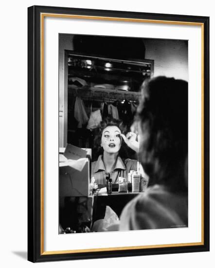 Debutante Actress Tina L. Meyer Putting on False Eyelashes in Dressing Room-Nina Leen-Framed Premium Photographic Print
