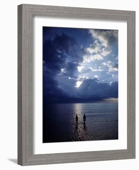 December 1946: Children Wading in the Water During a Late Afternoon Storm at Montego Bay, Jamaica-Eliot Elisofon-Framed Photographic Print