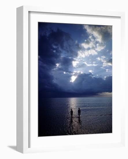 December 1946: Children Wading in the Water During a Late Afternoon Storm at Montego Bay, Jamaica-Eliot Elisofon-Framed Photographic Print