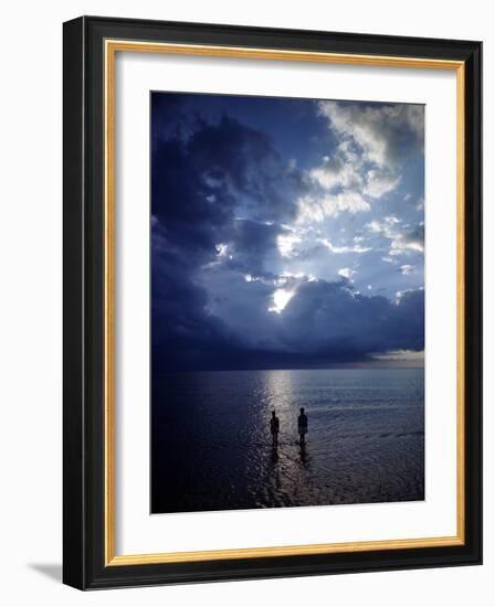 December 1946: Children Wading in the Water During a Late Afternoon Storm at Montego Bay, Jamaica-Eliot Elisofon-Framed Photographic Print