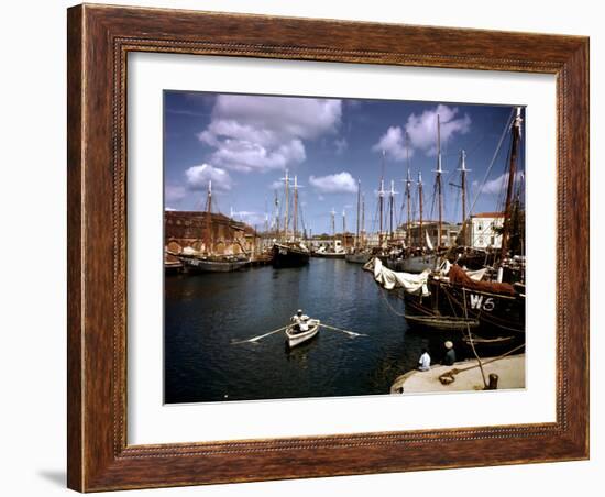 December 1946: Harbor Police in the Rowboat in Bridgetown Harbor, Barbados-Eliot Elisofon-Framed Photographic Print