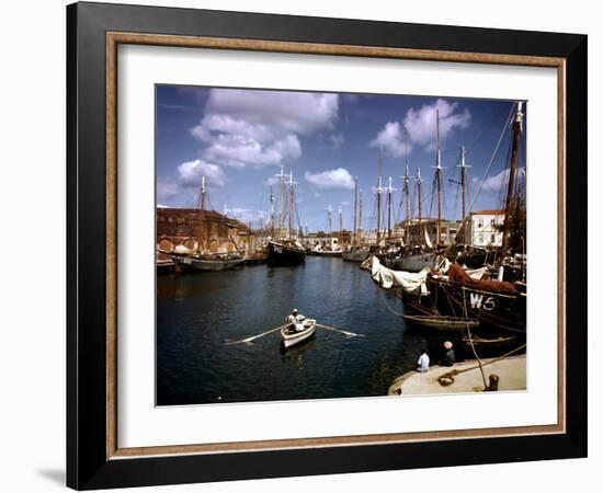 December 1946: Harbor Police in the Rowboat in Bridgetown Harbor, Barbados-Eliot Elisofon-Framed Photographic Print