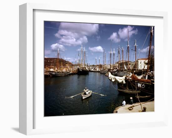 December 1946: Harbor Police in the Rowboat in Bridgetown Harbor, Barbados-Eliot Elisofon-Framed Photographic Print