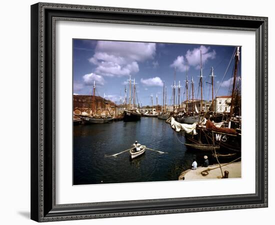 December 1946: Harbor Police in the Rowboat in Bridgetown Harbor, Barbados-Eliot Elisofon-Framed Photographic Print