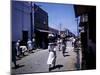 December 1946: Passersby at Market Street in Montego Bay, Jamaica-Eliot Elisofon-Mounted Photographic Print