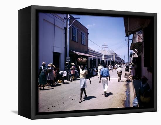 December 1946: Passersby at Market Street in Montego Bay, Jamaica-Eliot Elisofon-Framed Premier Image Canvas