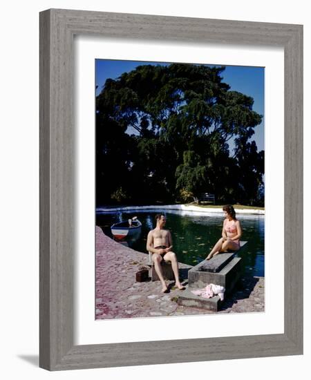 December 1946: Swimmers Relaxing by the Pool at Shaw Park Resort Hotel in Ocho Rios, Jamaica-Eliot Elisofon-Framed Photographic Print