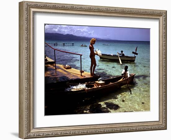 December 1946: Woman and Fishermen at Doctor's Cave Beach in Montego Bay, Jamaica-Eliot Elisofon-Framed Photographic Print