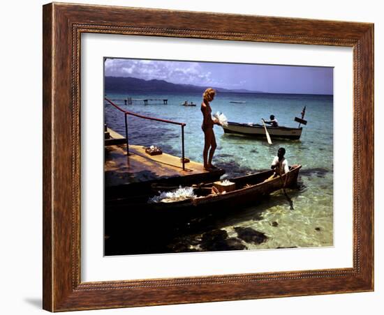 December 1946: Woman and Fishermen at Doctor's Cave Beach in Montego Bay, Jamaica-Eliot Elisofon-Framed Photographic Print