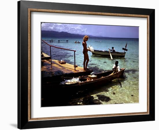 December 1946: Woman and Fishermen at Doctor's Cave Beach in Montego Bay, Jamaica-Eliot Elisofon-Framed Photographic Print