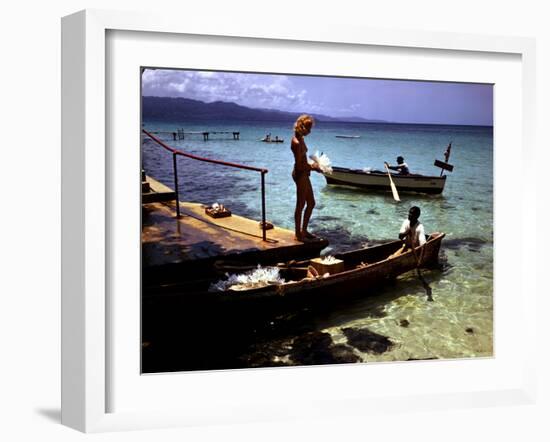 December 1946: Woman and Fishermen at Doctor's Cave Beach in Montego Bay, Jamaica-Eliot Elisofon-Framed Photographic Print