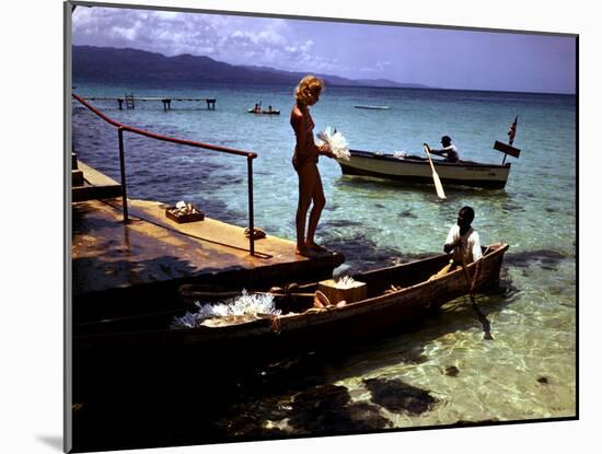 December 1946: Woman and Fishermen at Doctor's Cave Beach in Montego Bay, Jamaica-Eliot Elisofon-Mounted Photographic Print
