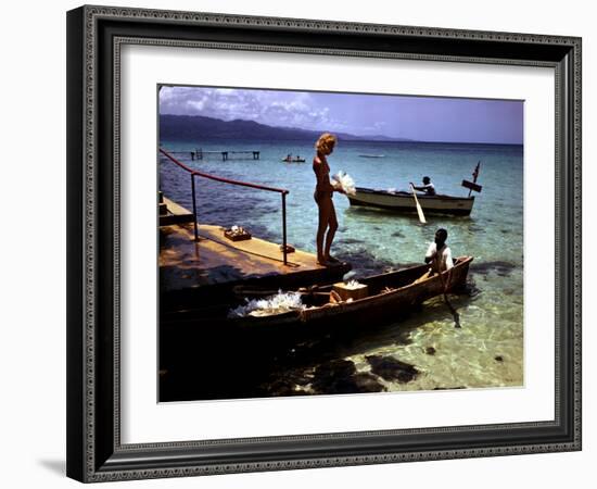 December 1946: Woman and Fishermen at Doctor's Cave Beach in Montego Bay, Jamaica-Eliot Elisofon-Framed Photographic Print