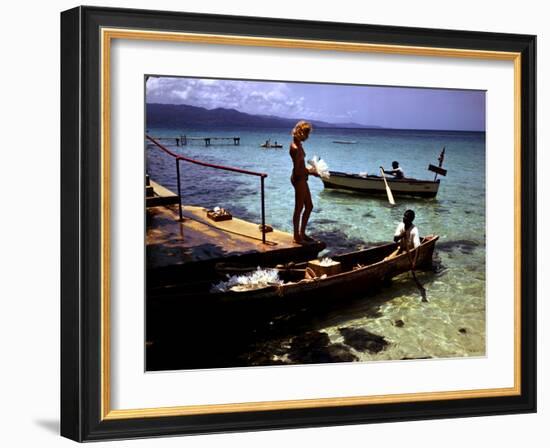 December 1946: Woman and Fishermen at Doctor's Cave Beach in Montego Bay, Jamaica-Eliot Elisofon-Framed Photographic Print